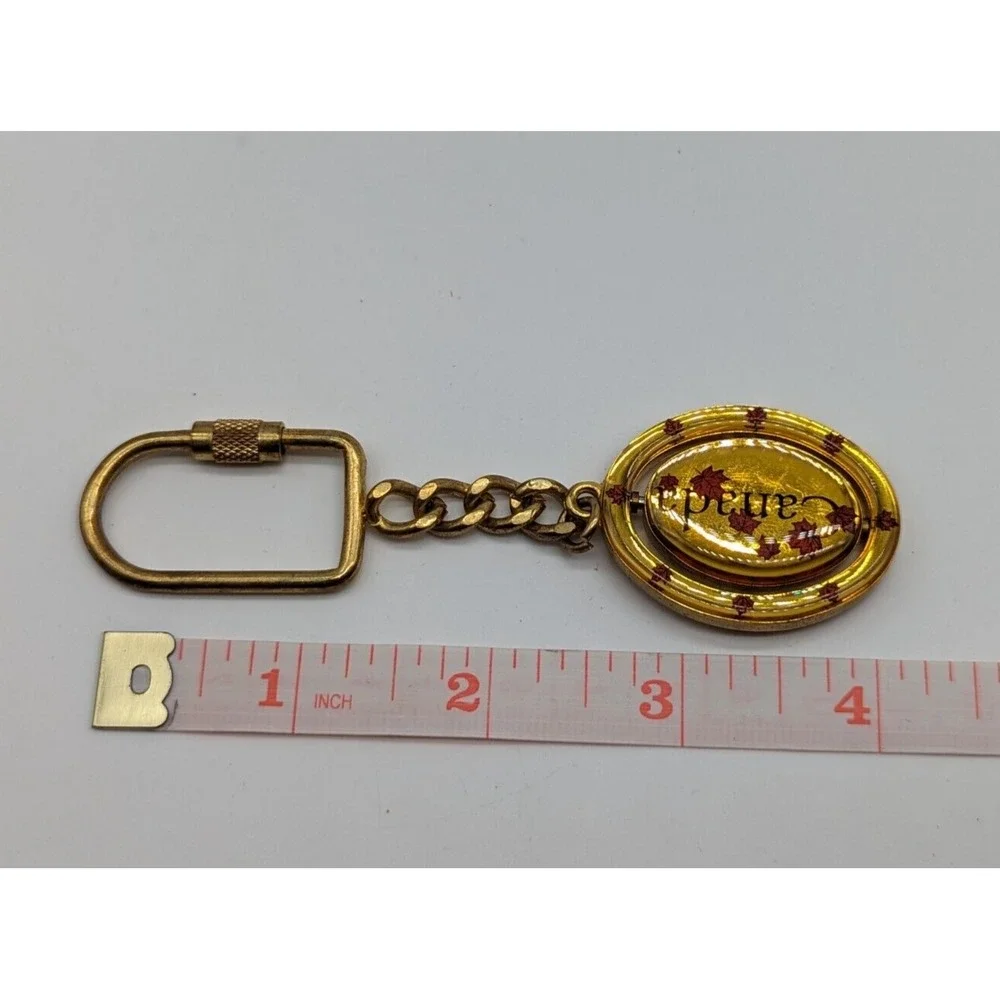 Vintage Canada Flippable Swivel Metal Enamel Keychain 4